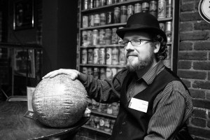 Matthew Francis with the Universe (in beach ball form). Photo by Tony Hitchcock.