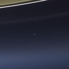That dot is Earth. You're somewhere in that dot. [Credit: NASA/JPL-Caltech/SSI ]