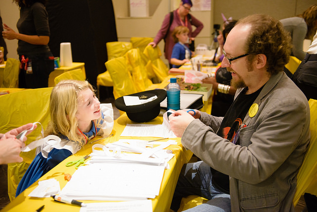 Here I am teaching Alice in Wonderland about Möbius strips and other fun mathematical concepts at GeekGirlCon last month. According to cultural stereotypes promoted by the New York Times, I shouldn't bother because girls aren't interested in math. [Credit: GeekGirlCon on Flickr]